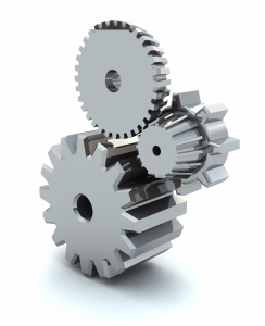 Picture of three cogs, representing manufacturing