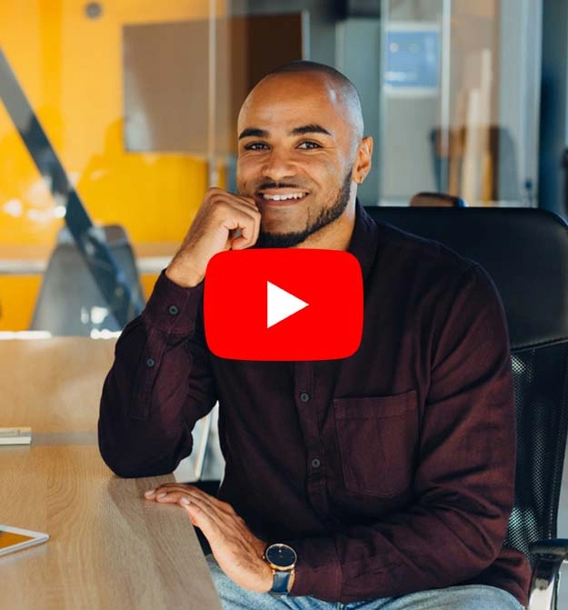 Man smiling at screen after using Zetadocs AP automation on Business Central