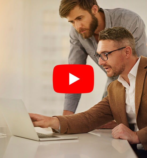 Man showing another man how to use Zetadocs on Business Central