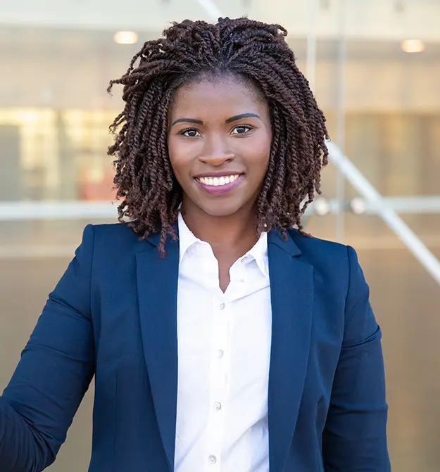 A professional woman with a smile on her face after using Zetadocs Expenses for the HR managers page thumbnail